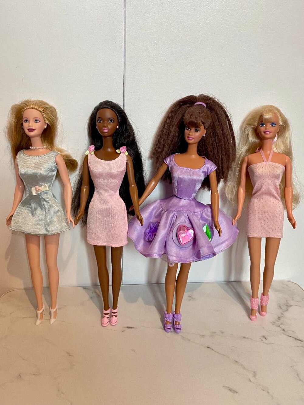 Vintage 1990s and Y2K Barbie and Twirlin' Make Up Teresa Dolls - Lot of 4